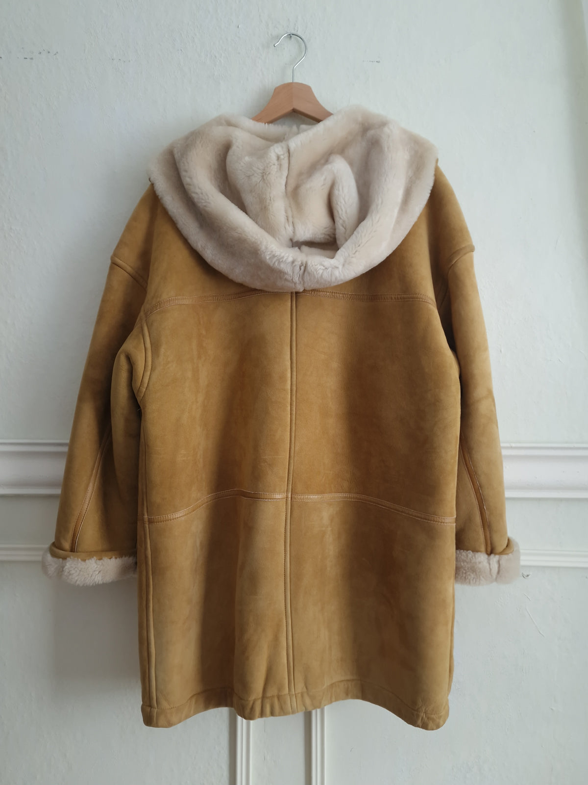 Vintage sheepskin coat in warm camel