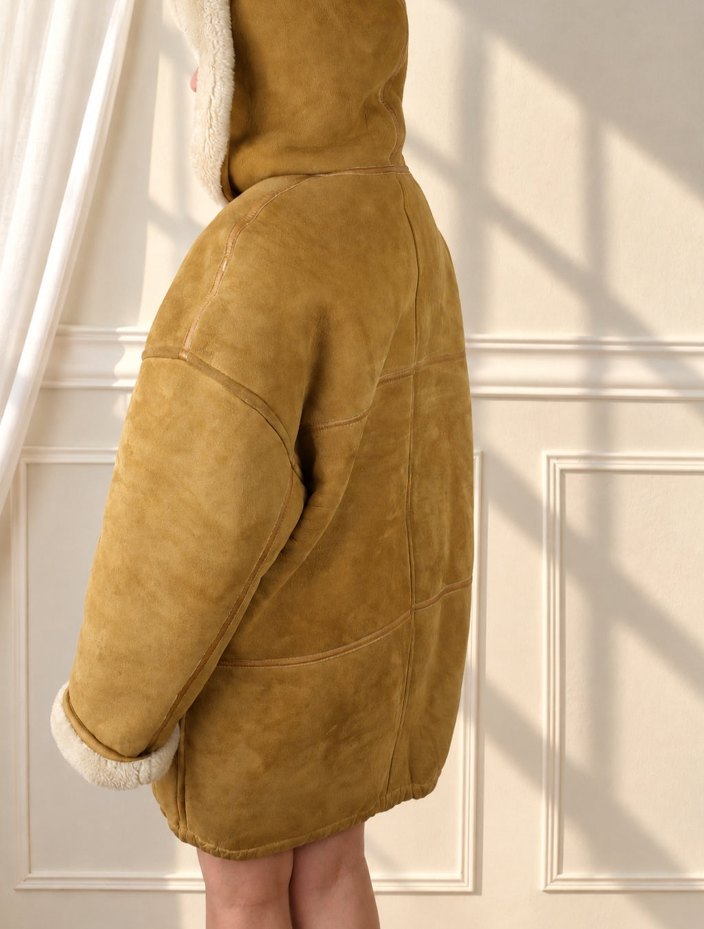 Vintage sheepskin coat in warm camel