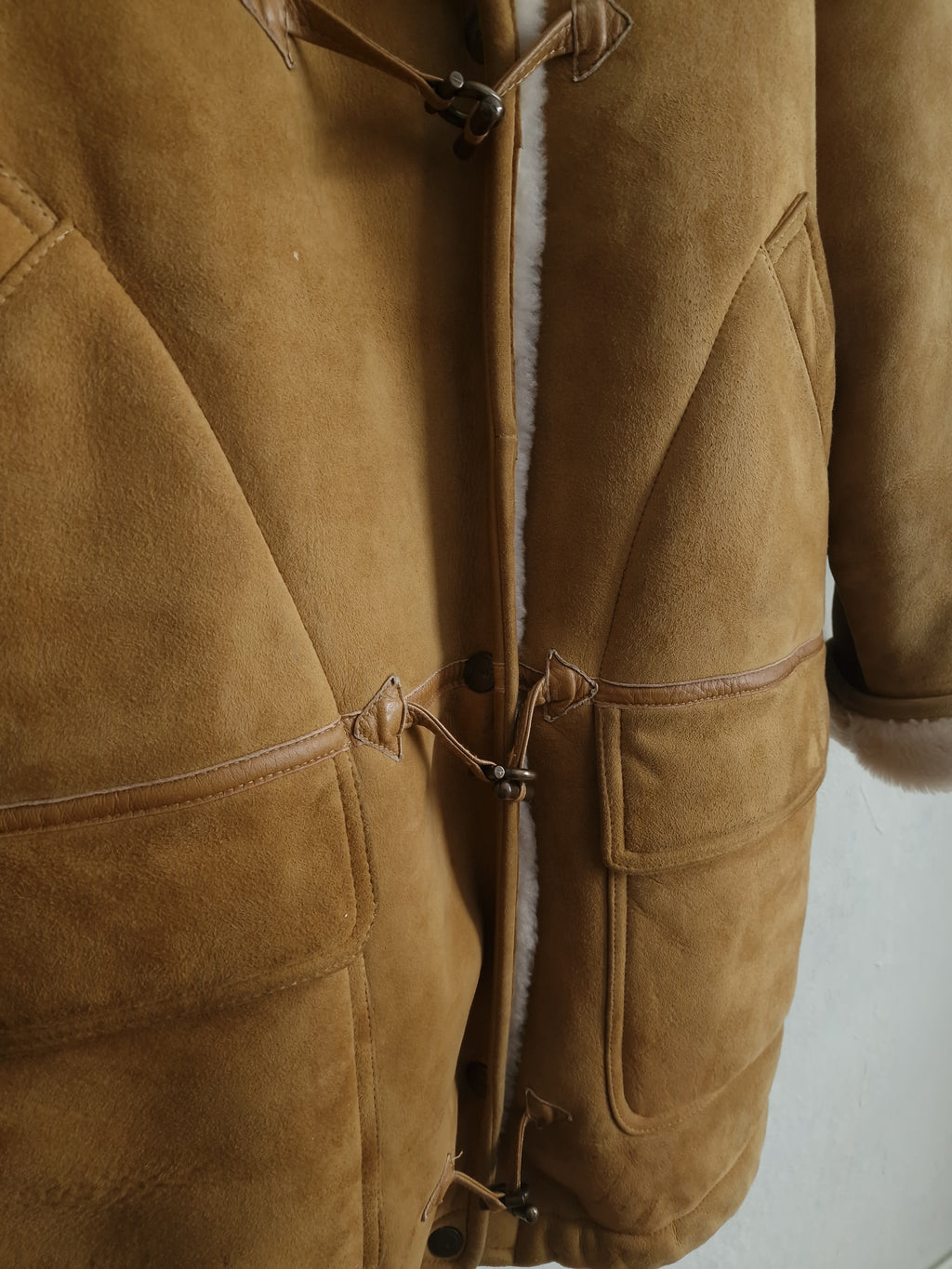 Vintage sheepskin coat in warm camel