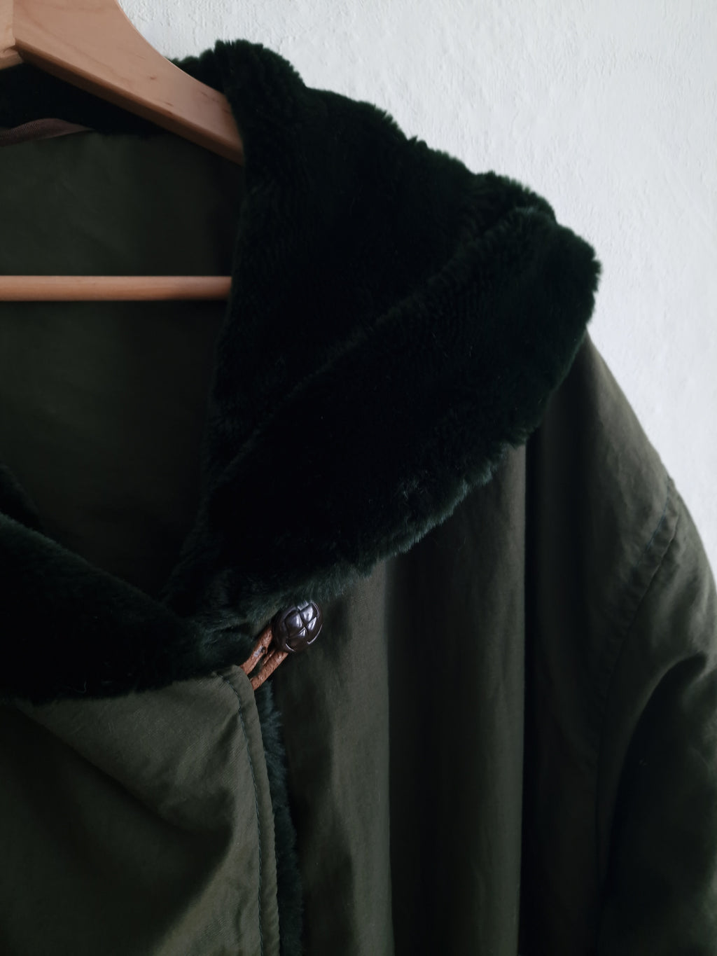 Vintage oversized coat in olive green with an expansive faux-fur shawl collar