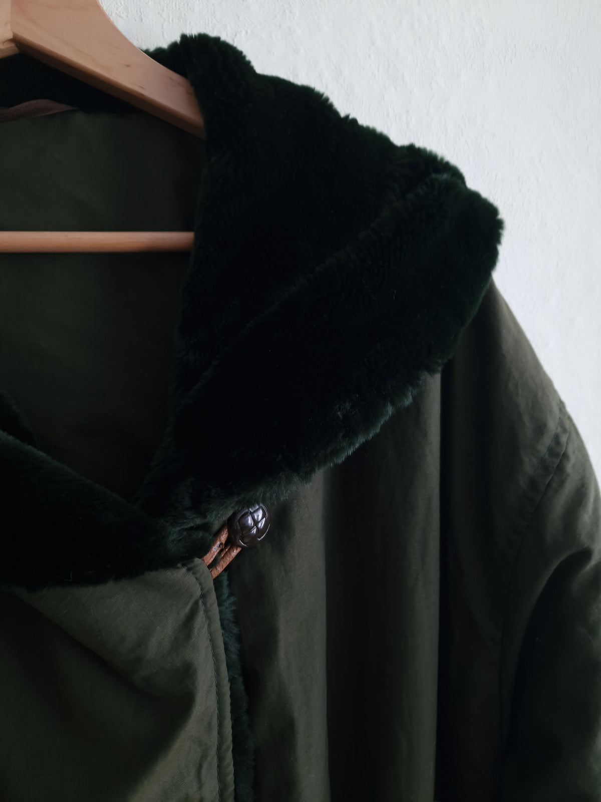 Vintage oversized coat in olive green with an expansive faux-fur shawl collar